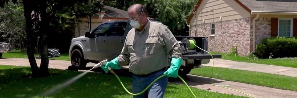 Spraying Insecticide Outdoors