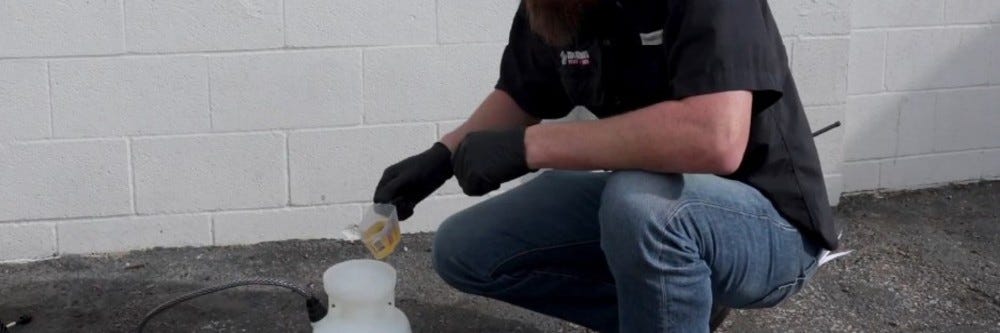 Eraser mixing in a pump sprayer