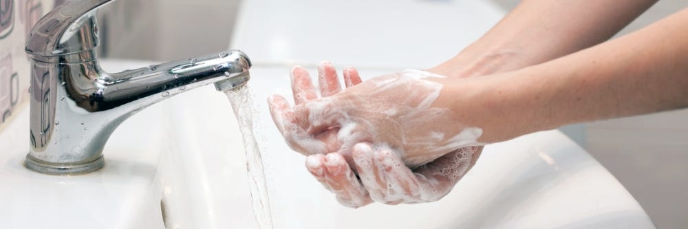 Washing Hands in Sink