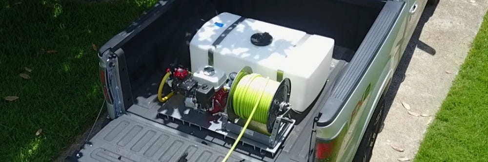 Spray rig in truck with Hannay reel Spray rig in truck